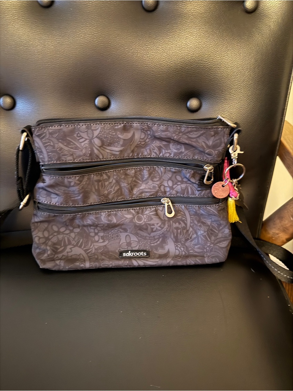 Sakroots Gray Floral Pattern Crossbody Bag with Tassel Charm